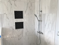 brand new shower in bathroom